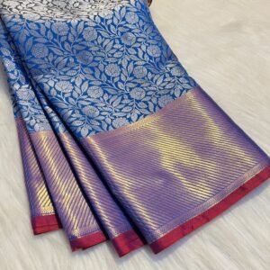 Royal blue Banarasi silk saree with silver floral zari work and dual-tone purple-gold pallu